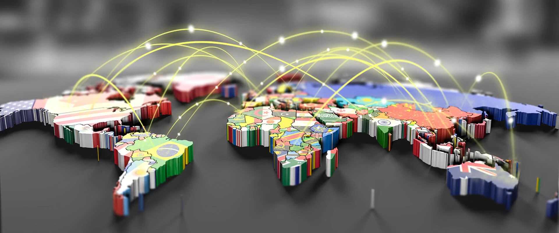 Welt mit Flaggen vernetzt Bildbeschreibung / description: Unternehmensreisen | Bild: CarlosAndreSantos / istockphoto.com